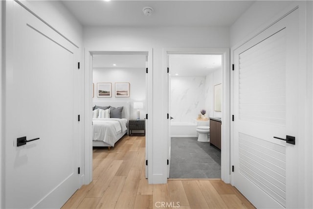 150 S Oak Knoll Ave Unit 103, Pasadena, CA 91101 - hallway featuring light wood finished floors and recessed lighting