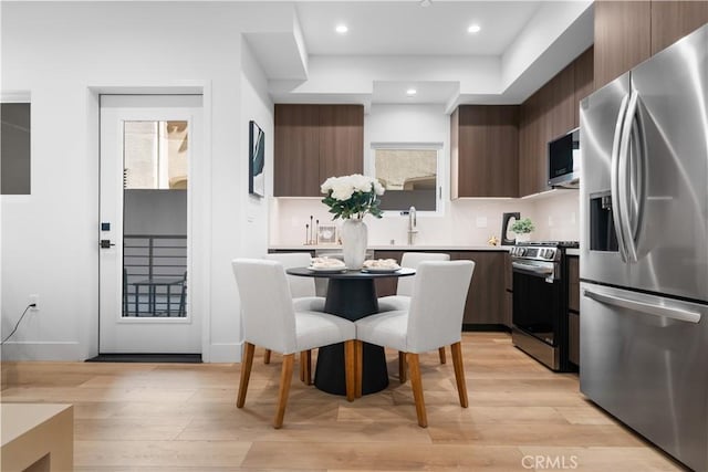 150 S Oak Knoll Ave Unit 103, Pasadena, CA 91101 - kitchen with stainless steel appliances, modern cabinets, light wood-style floors, light countertops, and recessed lighting