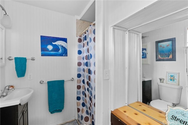 211 S K St, Lompoc, CA 93436 - full bath featuring vanity, toilet, and a shower with curtain