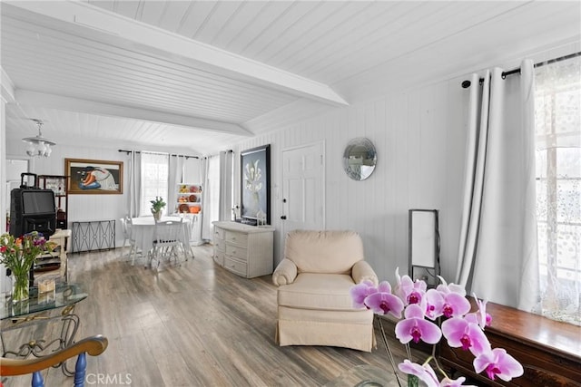 211 S K St, Lompoc, CA 93436 - living room with beamed ceiling, wood finished floors, and a chandelier