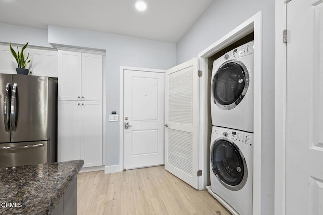 13124 Central Ave Unit 201, Hawthorne, CA 90250 - washroom with stacked washer / dryer, light wood-style floors, and recessed lighting