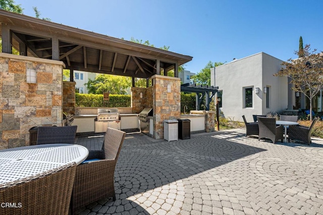13124 Central Ave Unit 201, Hawthorne, CA 90250 - view of patio / terrace featuring outdoor dining area, a pergola, and a gazebo