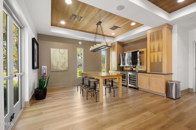13124 Central Ave Unit 201, Hawthorne, CA 90250 - dining space with a raised ceiling, wood ceiling, beverage cooler, plenty of natural light, and recessed lighting
