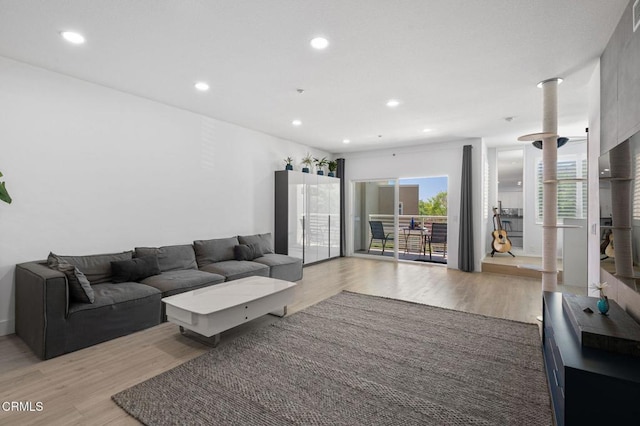 13124 Central Ave Unit 201, Hawthorne, CA 90250 - living room featuring light wood-style floors and recessed lighting