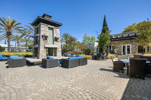 13124 Central Ave Unit 201, Hawthorne, CA 90250 - surrounding community with an outdoor living space, a patio area, and outdoor dining space
