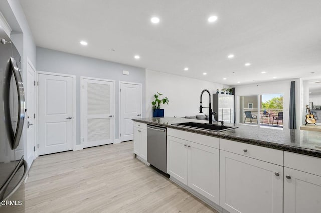 13124 Central Ave Unit 201, Hawthorne, CA 90250 - kitchen featuring appliances with stainless steel finishes, a sink, recessed lighting, white cabinetry, and light wood-style floors