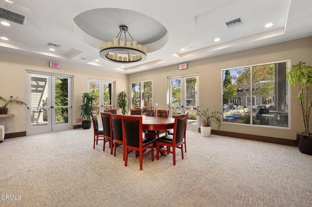 13124 Central Ave Unit 201, Hawthorne, CA 90250 - dining space featuring french doors, a tray ceiling, carpet, and recessed lighting