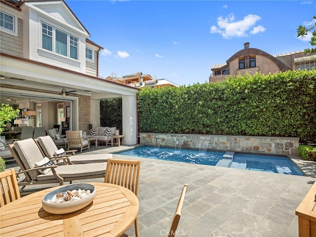 1324 E Balboa Blvd, Newport Beach, CA 92661 - view of swimming pool with an outdoor living space, a patio, and a pool with connected hot tub