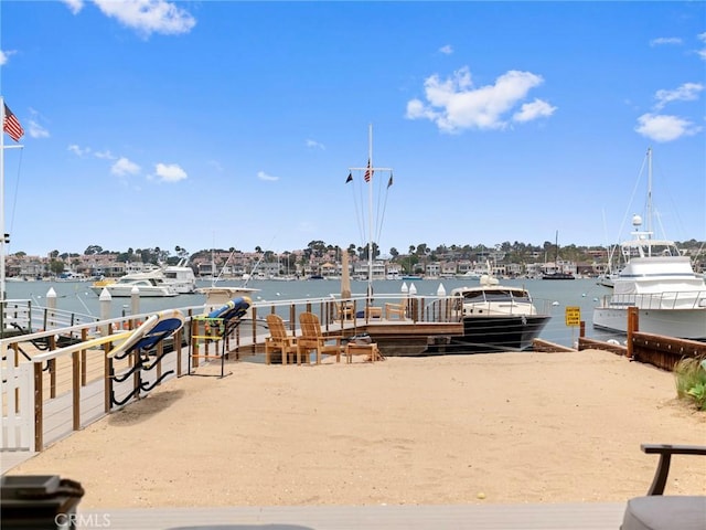1324 E Balboa Blvd, Newport Beach, CA 92661 - dock area featuring a water view and view of marina