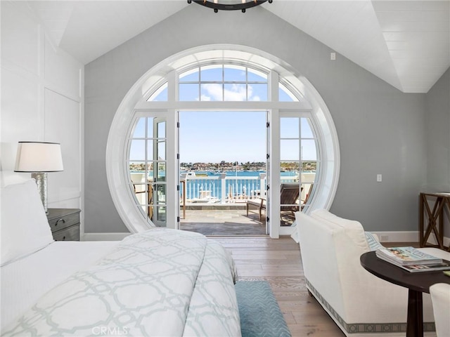 1324 E Balboa Blvd, Newport Beach, CA 92661 - bedroom with lofted ceiling, a water view, access to exterior, and wood finished floors