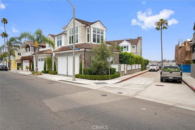 1324 E Balboa Blvd, Newport Beach, CA 92661 - view of asphalt road with sidewalks, curbs, a residential view, and street lights