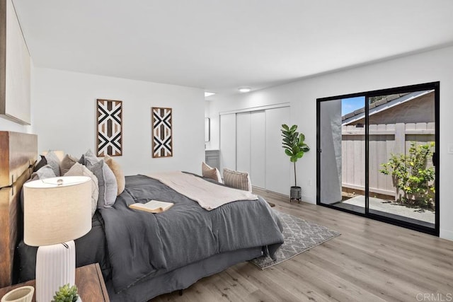 6843 Claremore Ave, San Diego, CA 92120 - bedroom featuring wood finished floors, access to outside, and a closet