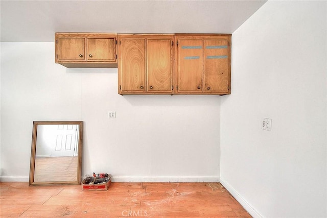1507 4th St, Norco, CA 92860 - washroom with baseboards and light wood finished floors