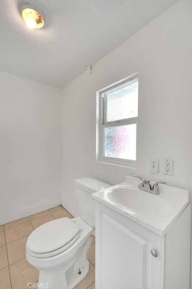 1507 4th St, Norco, CA 92860 - bathroom featuring vanity, toilet, tile patterned floors, and a textured ceiling