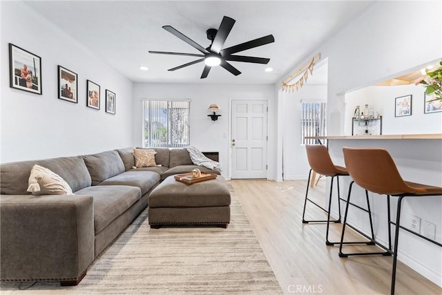 660 S Glassell St Unit 14, Orange, CA 92866 - living area featuring light wood-style flooring, ceiling fan, and recessed lighting