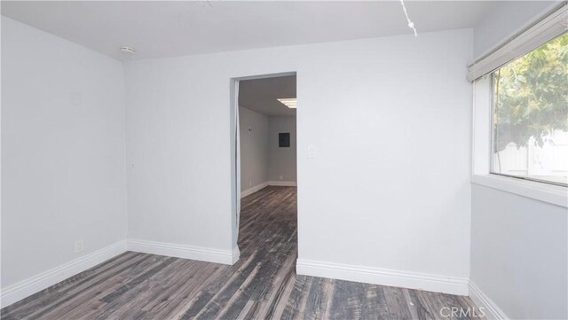 1541 N Stanley Ave, Los Angeles, CA 90046 - spare room with wood finished floors and baseboards