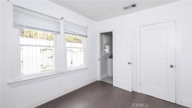 1541 N Stanley Ave, Los Angeles, CA 90046 - unfurnished bedroom with dark wood-type flooring and baseboards