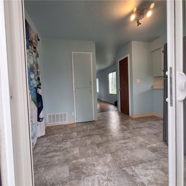 3473 Mclean St, Eureka, CA 95501 - empty room featuring baseboards and stone finish flooring