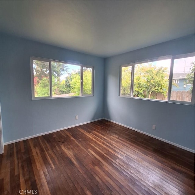 3473 Mclean St, Eureka, CA 95501 - spare room featuring dark wood-style flooring and baseboards