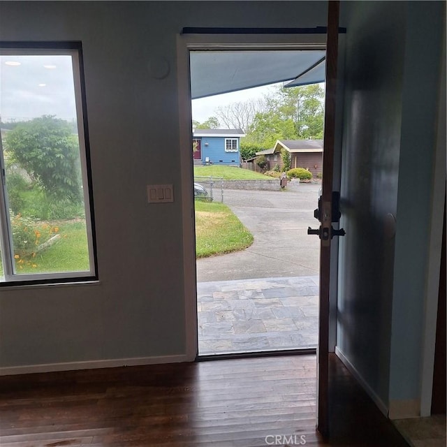 3473 Mclean St, Eureka, CA 95501 - doorway to outside featuring baseboards and wood finished floors