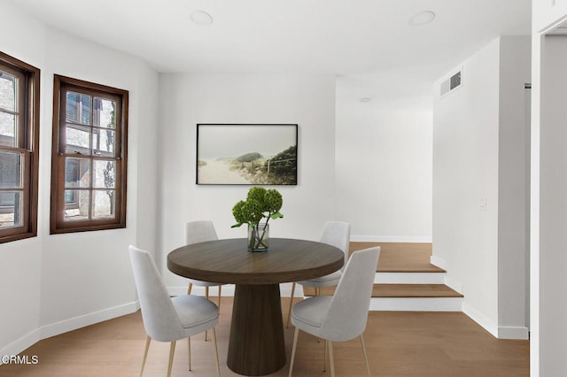 11940 Weddington St Unit 19, Valley Village, CA 91607 - dining room featuring wood finished floors