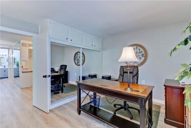 2109 Via Puerta Unit A, Laguna Woods, CA 92637 - office with light wood-style flooring and baseboards