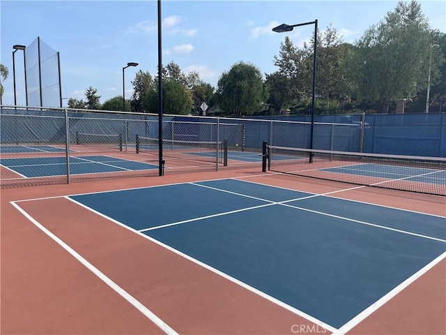2109 Via Puerta Unit A, Laguna Woods, CA 92637 - view of tennis court with community basketball court