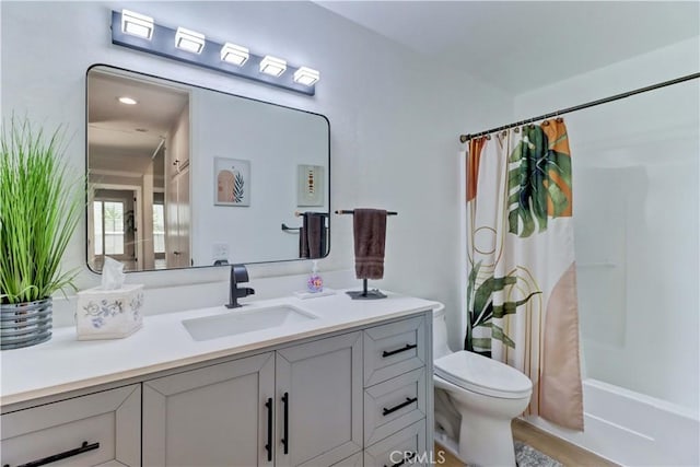 2109 Via Puerta Unit A, Laguna Woods, CA 92637 - full bathroom featuring toilet, vanity, and shower / bath combination with curtain