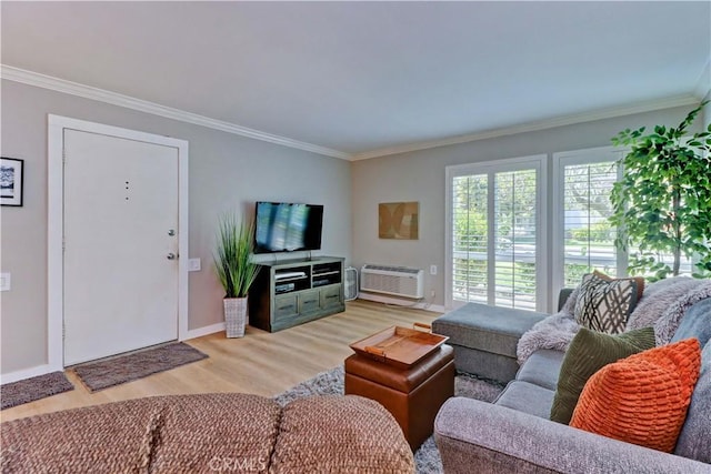 2109 Via Puerta Unit A, Laguna Woods, CA 92637 - living room with light wood-style flooring, crown molding, a wall mounted AC, and baseboards