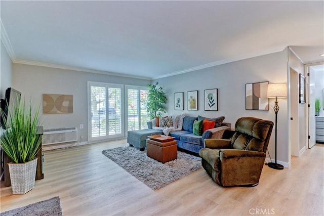 2109 Via Puerta Unit A, Laguna Woods, CA 92637 - living area featuring ornamental molding, baseboards, and wood finished floors