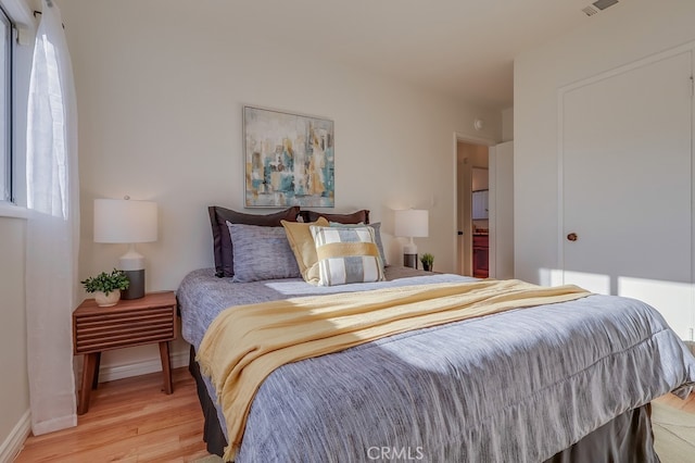 3562 N Studebaker, Long Beach, CA 90808 - bedroom with light wood-type flooring and baseboards