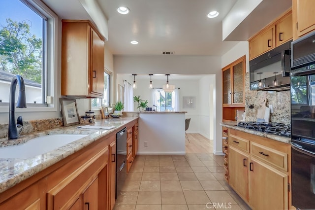 3562 N Studebaker, Long Beach, CA 90808 - kitchen featuring black appliances, a sink, light tile patterned flooring, light stone countertops, and backsplash