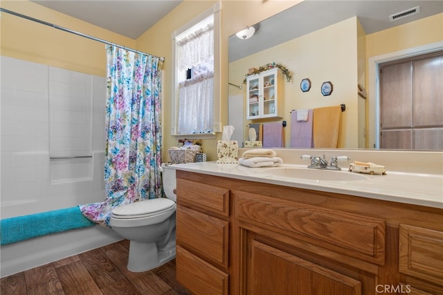 73 Mockingbird Ln, Templeton, CA 93465 - full bath with toilet, wood finished floors, shower / tub combo, and vanity