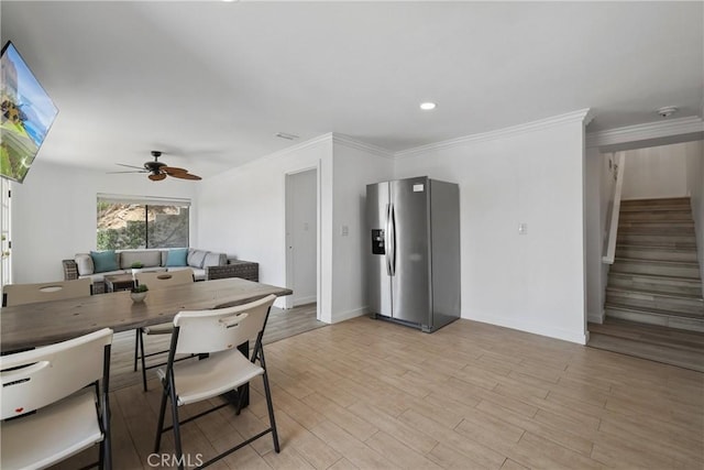 12235 Circula Panorama, North Tustin, CA 92705 - dining space featuring stairs, a ceiling fan, baseboards, light wood-type flooring, and crown molding