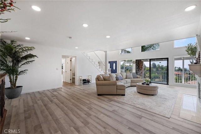 12235 Circula Panorama, North Tustin, CA 92705 - living room featuring stairs, wood finished floors, recessed lighting, and baseboards