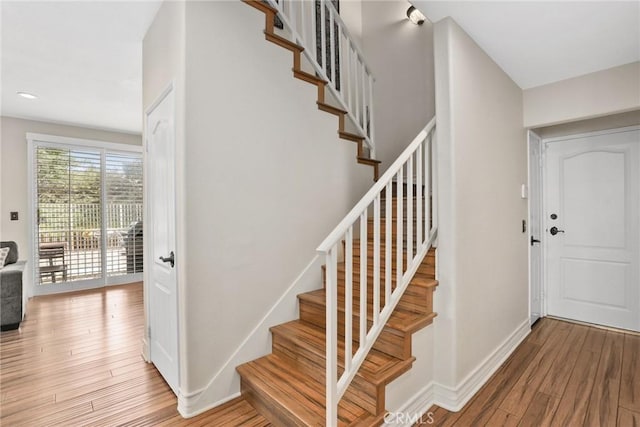 18102 Flynn Dr Unit 4602, Canyon Country, CA 91387 - staircase with wood finished floors and baseboards