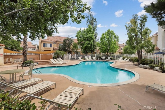 18102 Flynn Dr Unit 4602, Canyon Country, CA 91387 - community pool with a patio area and a residential view