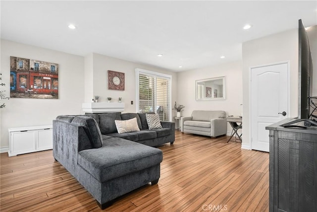 18102 Flynn Dr Unit 4602, Canyon Country, CA 91387 - living room with light wood-style flooring and recessed lighting