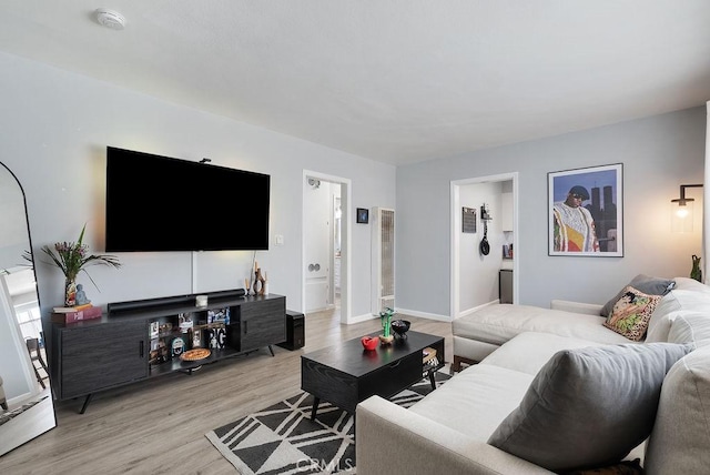 158 W Del Amo Blvd, Long Beach, CA 90805 - living room featuring light wood-style flooring and a heating unit