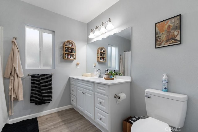 158 W Del Amo Blvd, Long Beach, CA 90805 - bathroom with vanity, wood finished floors, and plenty of natural light