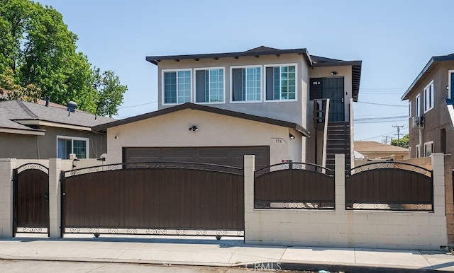 158 W Del Amo Blvd, Long Beach, CA 90805 - view of front of property featuring a gate, a fenced front yard, and stucco siding