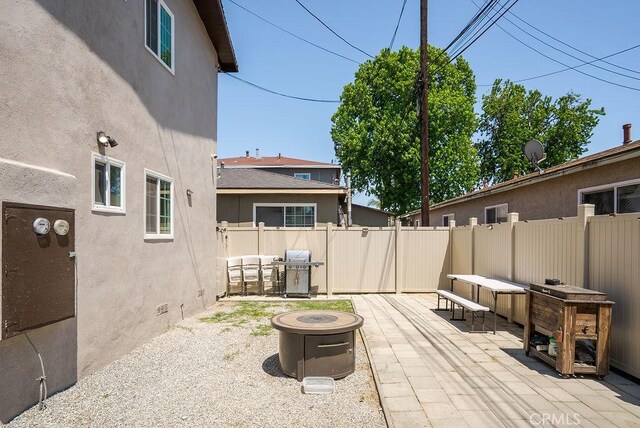 158 W Del Amo Blvd, Long Beach, CA 90805 - view of patio / terrace with grilling area and a fire pit