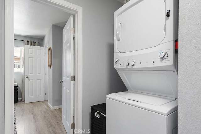 158 W Del Amo Blvd, Long Beach, CA 90805 - laundry room with stacked washer and clothes dryer and light wood-style floors