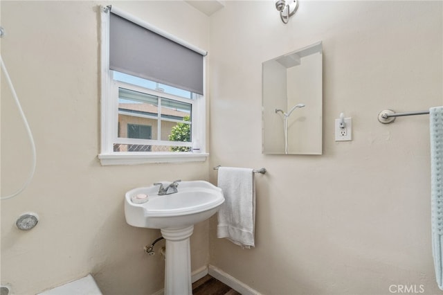 1415 W 104th St, Los Angeles, CA 90047 - bathroom featuring baseboards