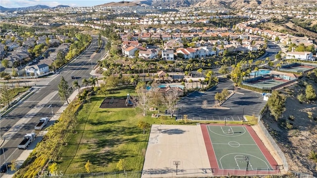 19752 Sierra Meadows Ln, Porter Ranch, CA 91326 - aerial view of property and surrounding area with a mountainous background and nearby suburban area