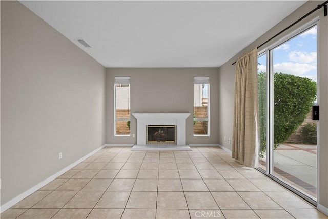 19752 Sierra Meadows Ln, Porter Ranch, CA 91326 - unfurnished living room with a glass covered fireplace and light tile patterned floors