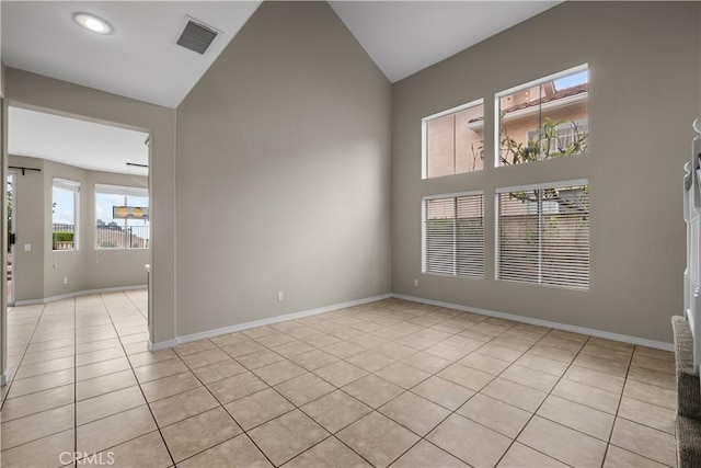 19752 Sierra Meadows Ln, Porter Ranch, CA 91326 - empty room with high vaulted ceiling, light tile patterned floors, and recessed lighting
