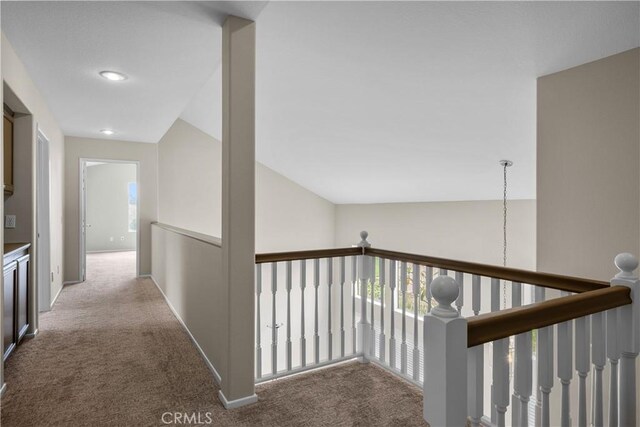 19752 Sierra Meadows Ln, Porter Ranch, CA 91326 - hallway with carpet floors and an upstairs landing