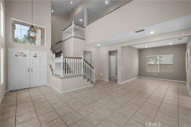 19752 Sierra Meadows Ln, Porter Ranch, CA 91326 - tiled foyer entrance with stairway and recessed lighting