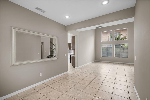 19752 Sierra Meadows Ln, Porter Ranch, CA 91326 - empty room featuring light tile patterned floors, recessed lighting, and stairs
